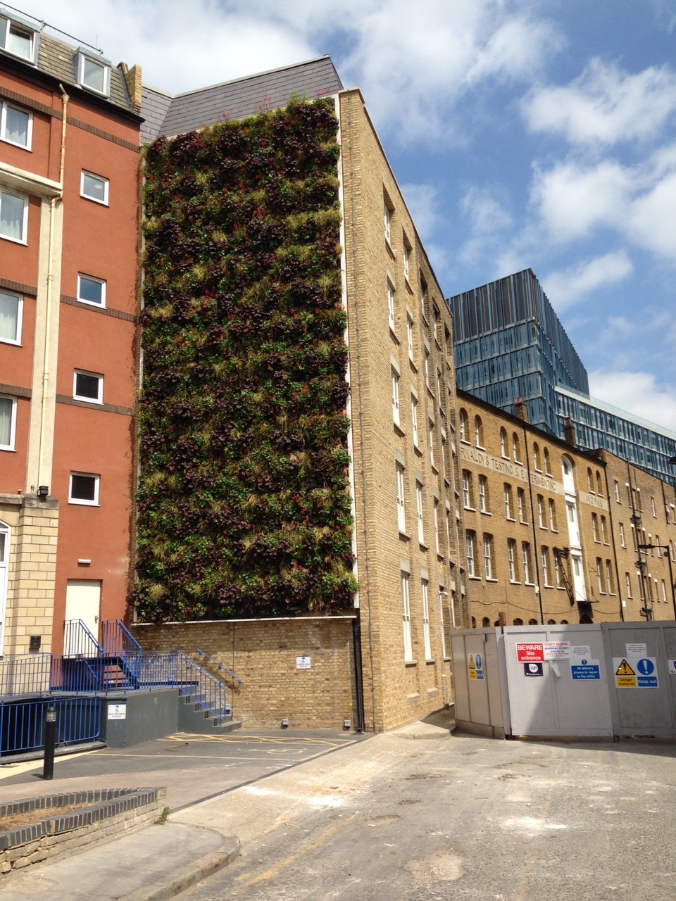 Example of a green wall on the side of an office building.