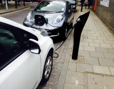 Electric vehicles being charged in London